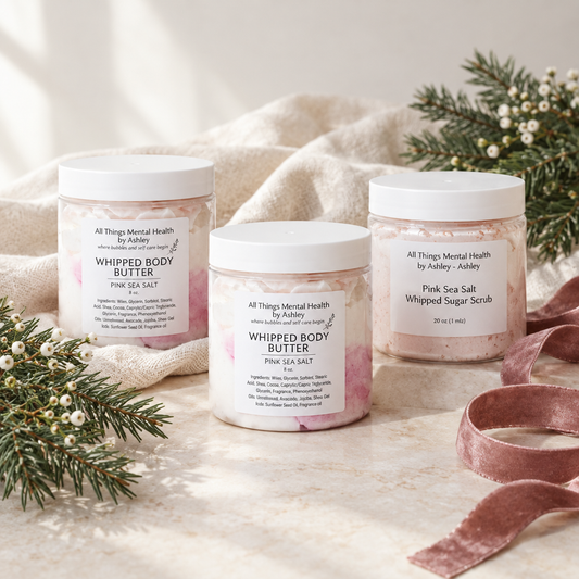 Example holiday trio with two Pink Sea Salt body butter jars and one Pink Sea Salt sugar scrub jar on cream linen.